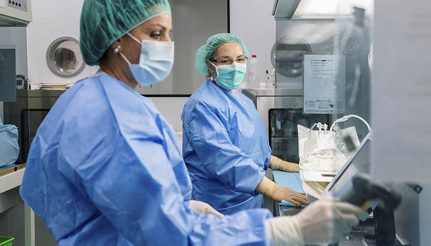 Two pharmaceutical women work in a laboratory